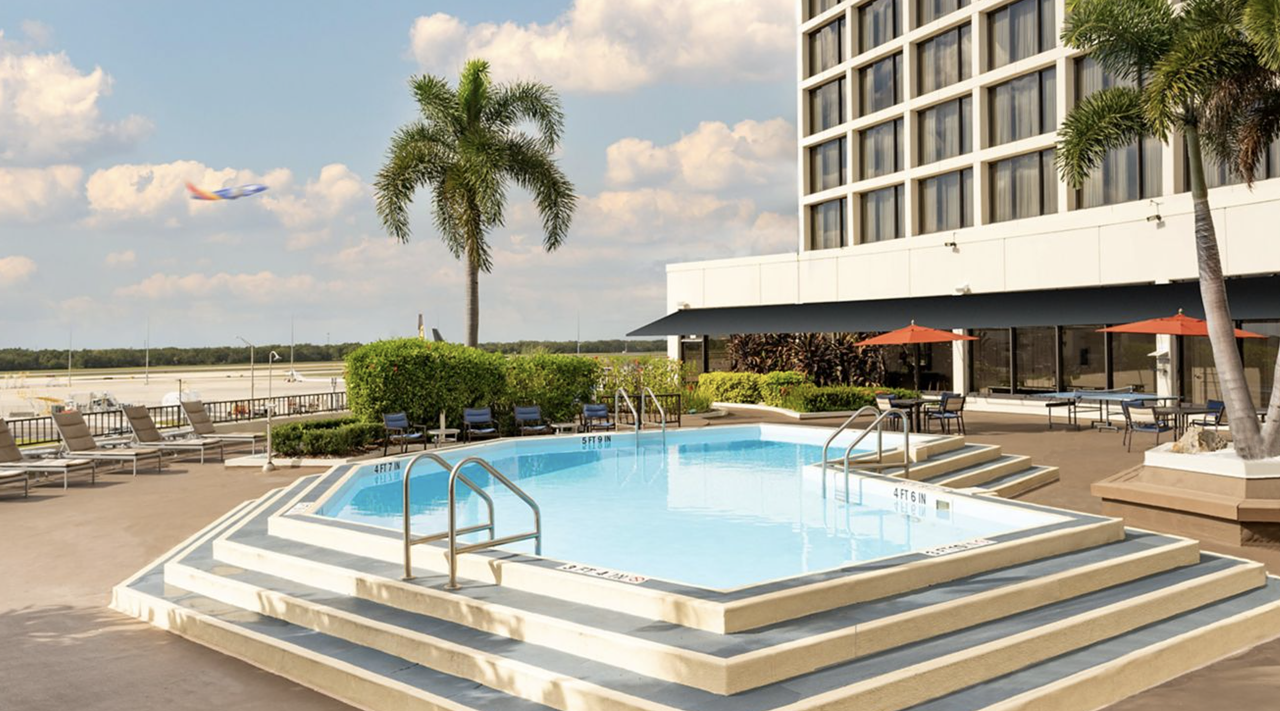 Tampa Airport Marriott
4200 George J Bean Pkwy, Tampa, 813-879-5151    
$35
One of the more underrated local rooftop bars, the Tampa Airport Marriott allows guests to sip on a cocktail from the heated pool as they watch 737s come and go. A day pass here comes with access to the fitness center, towel service, lounge chairs, free wi-fi and more. 
Photo via Tampa Airport Marriott/Website