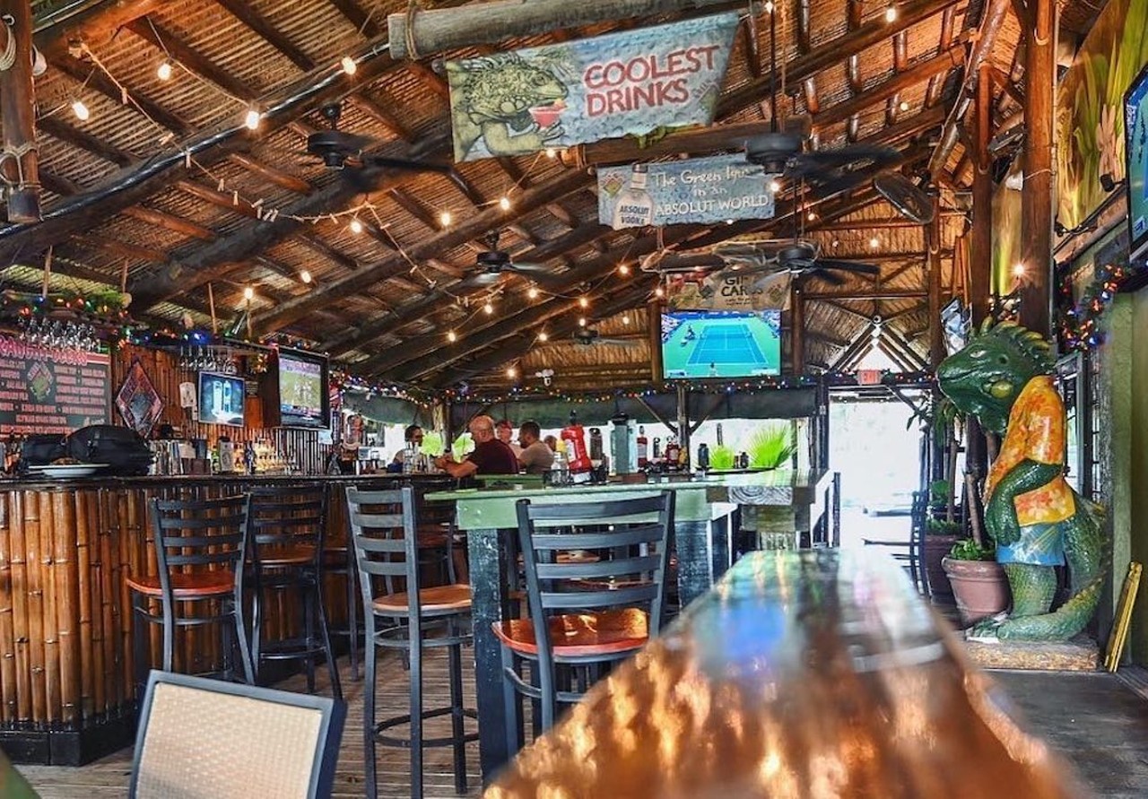 Green Iguana Bar & Grill
4029 S West Shore Blvd., Tampa, 813-837-1234
With thatched bamboo roofs, dark wood tables, two bar swings and iguanas rocking Hawaiian shirts, it’s no wonder why this reptilian-inspired tiki bar is one of the locals’ favorite old-school spots. Enjoy some mango margaritas, crab rangoon, baja burgers, fish-n-chips and more off the menu.
Photo via Green Iguana Bar & Grill/Facebook