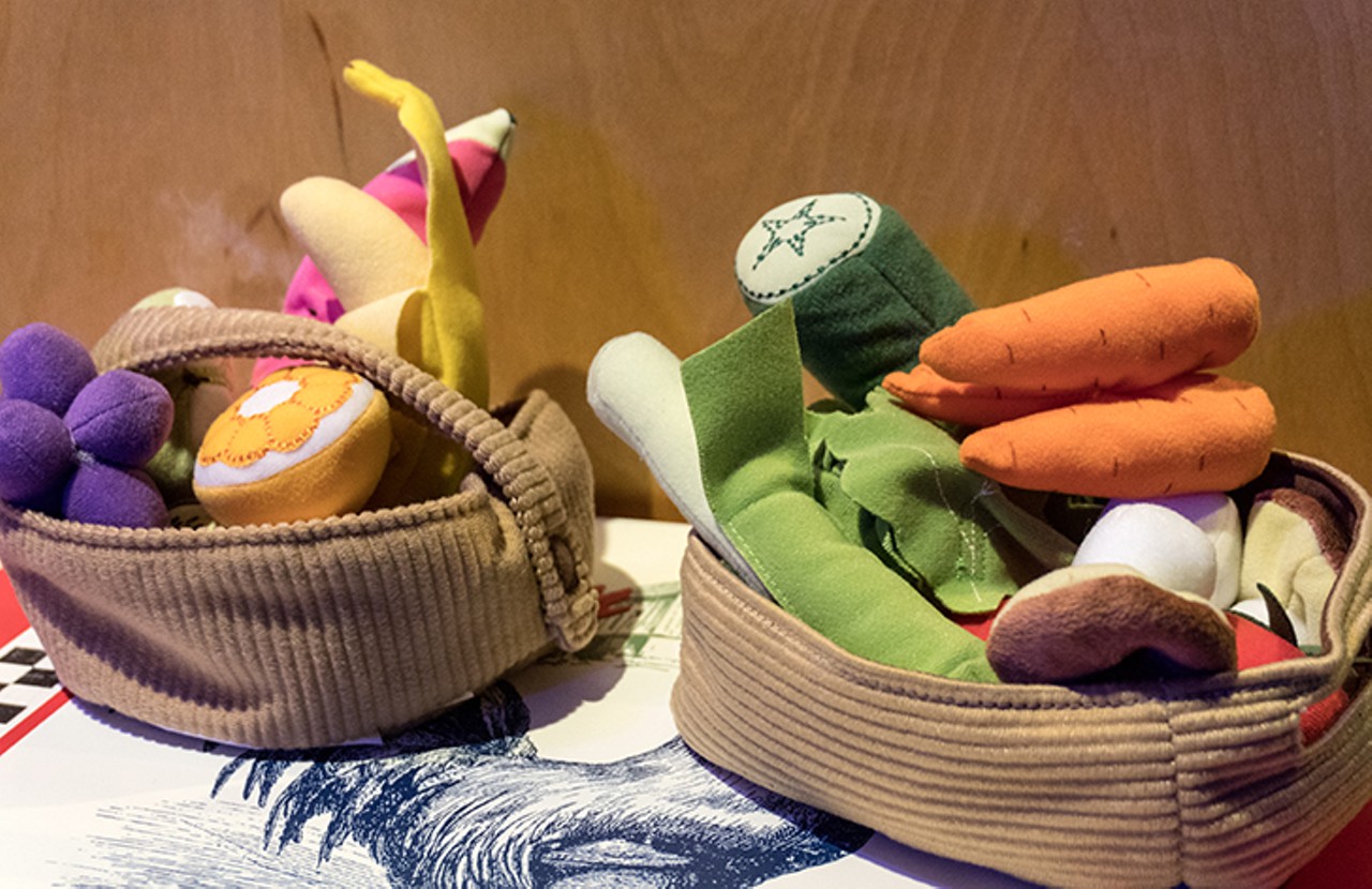 These baskets of stuffed fruits and vegetables are part of a still life station in the youth gallery. Kids can arrange the stuffed fruits and vegetables in any way they like, and then draw their custom-made still life.
Photo by Jennifer Ring