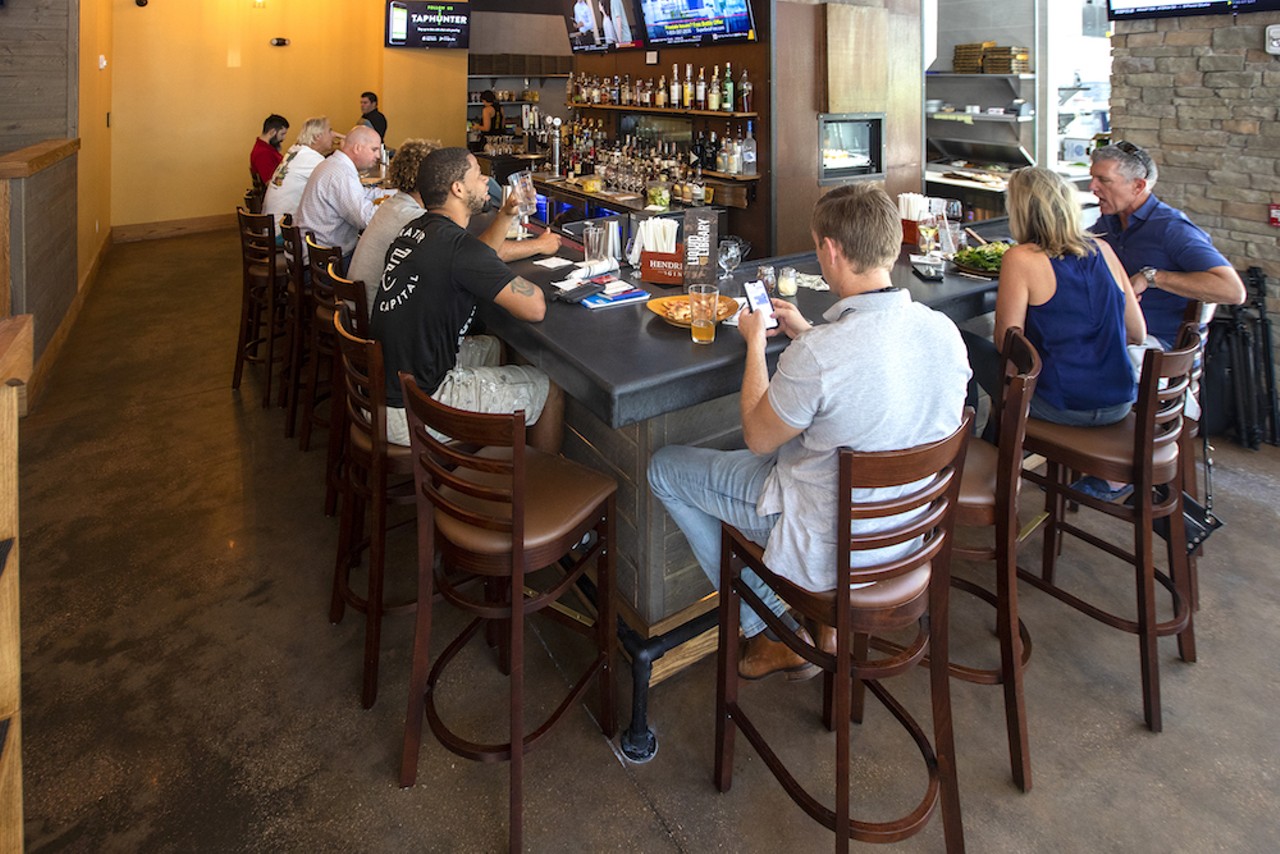 In addition to the self-serve beer wall, Oak & Stone offers a full bar to its patrons.
