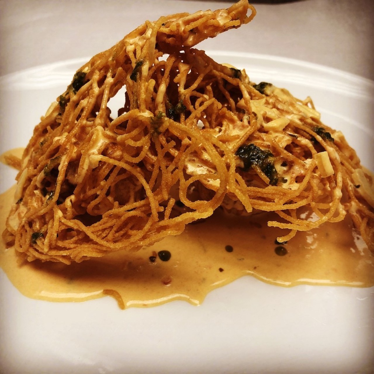The Bird's Nest
What happens when Lock and Dam Eatery wraps two large scallops in angel hair pasta, then tops the deep-fried cluster of delicousness with lobster cream sauce.