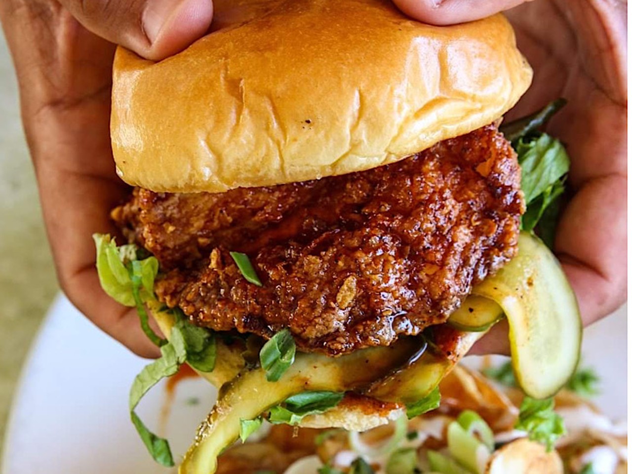 Datz
2616 S MacDill Ave, Tampa, FL
With two locations in the Tampa Bay area, Datz&#146; sandwich is affectionately named &#147;Cluck, Yeah&#148; and features &#147;Spicy Nashville&#148; fried chicken with pickles and lettuce, topped off with Nashville sauce. It&#146;s all put on an artisan bun. 
Photo via Datz/Facebook