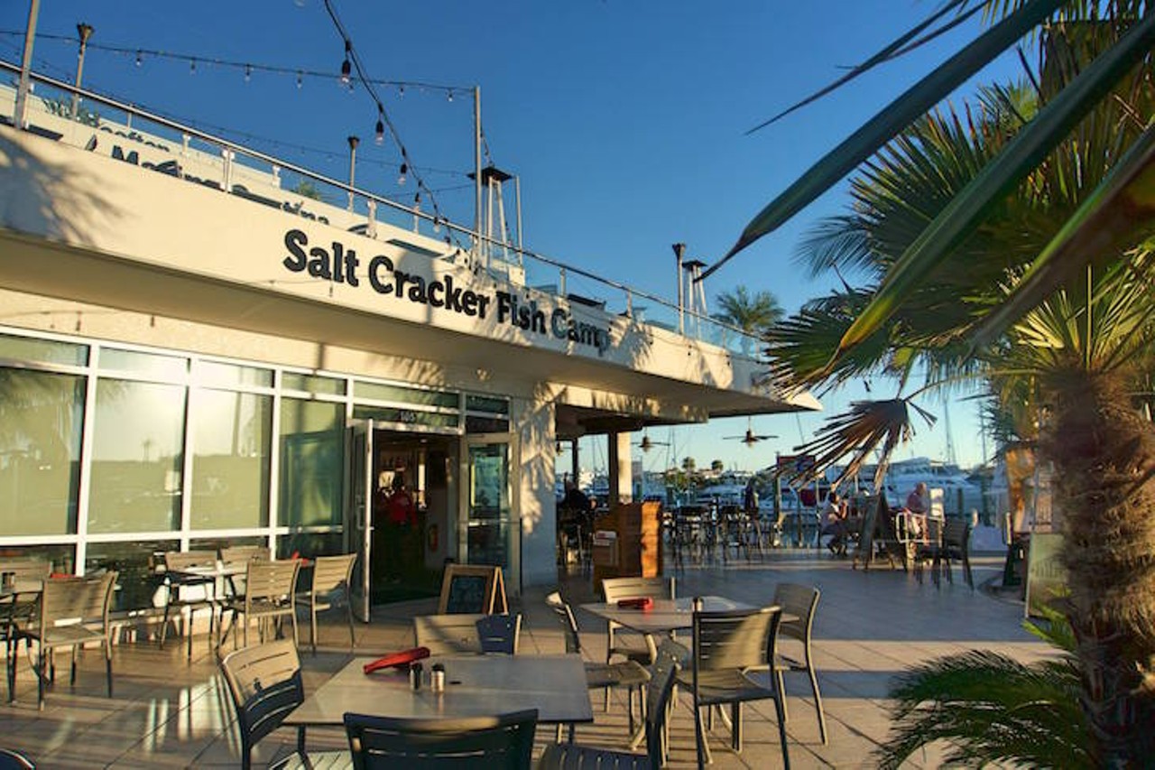 Salt Cracker Fish Camp    
25 Causeway Blvd, Clearwater, FL 33767, (727) 442-6910
You know your seafood is going to be fresh when the restaurant is in a marina.   Salt Cracker Fish Camp in Clearwater is known for their smoked fish dip and grouper sandwich, long list of breezy cocktails, and peaceful waterfront dining experience. They also have prized all day happy hour, two drinks for only $9. 
Photo via Salt Cracker Fish Camp/Facebook