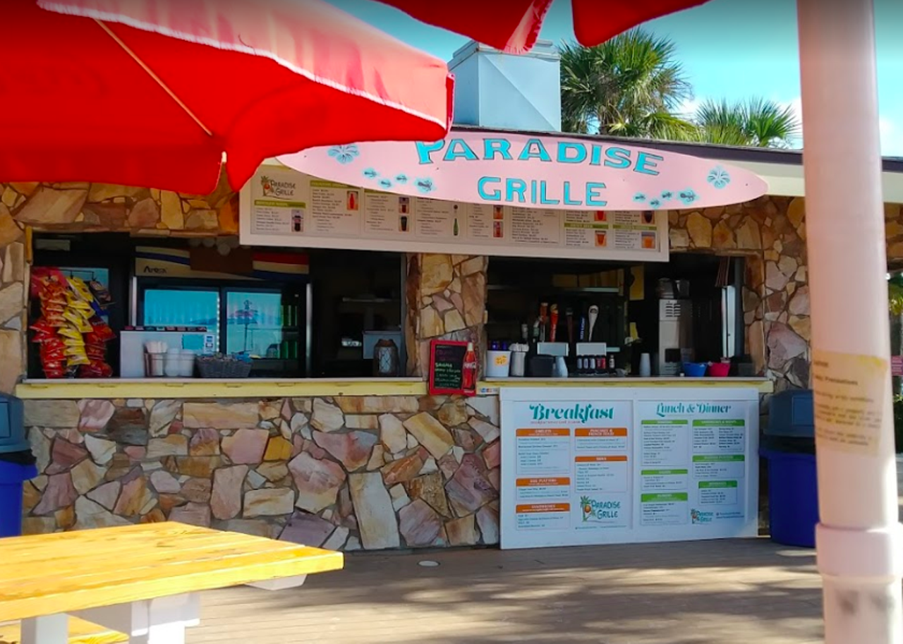 Paradise Grille
6850 Beach Plaza, St. Pete (727) 560-5399 
Upham Beach&#146;s Paradise Grille serves up the same breakfast, lunch and dinner menu items and beachside service as its Pass-A-Grille location, just at a different beach and with some different socially distant beachside picnic tables. 
Photo via Google Maps