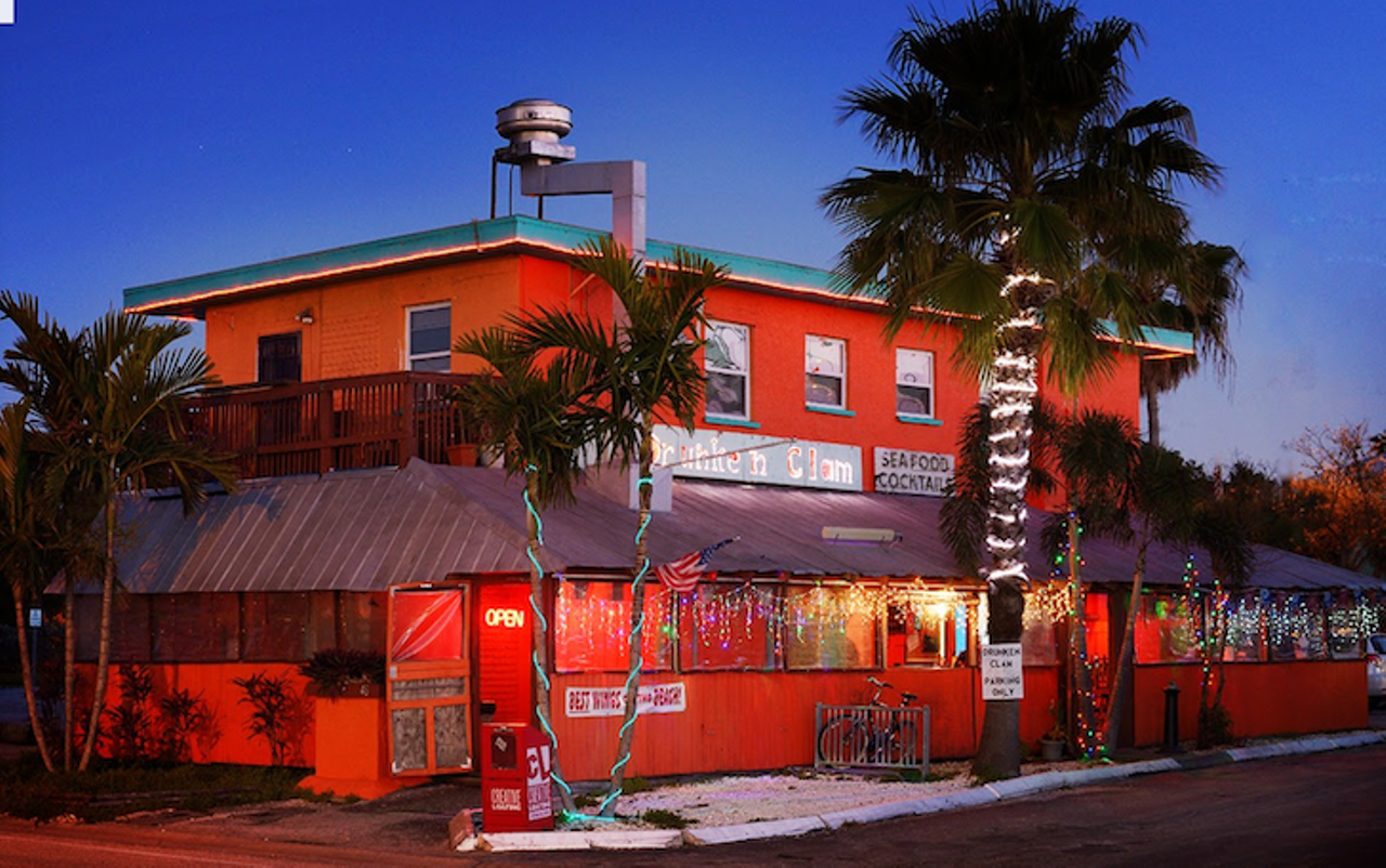 Drunken Clam
46 46th Ave., St. Pete Beach
The Drunken Clam is known for its &#147;naked&#148; unbreaded wings. Even with a small kitchen, the staff cooks fresh wings for about 20 minutes and douses them in a variety of sauces including the award winning cajun parmesan garlic sauce. The Drunken Clam also has fresh steamed clams, shrimp, seared sesame tuna and fresh ground beef burgers. The bar also serves breakfast and features live music.
Photo via Drunken Clam/Google