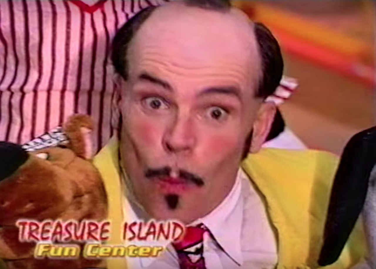 Sterling Powell
Sterling Powell, is the balding, overly-energetic clown who used to pop up in the Treasure Island Fun Center commercials. The arcade, which is actually in Seminole, is still in operation.
Photo via YouTube