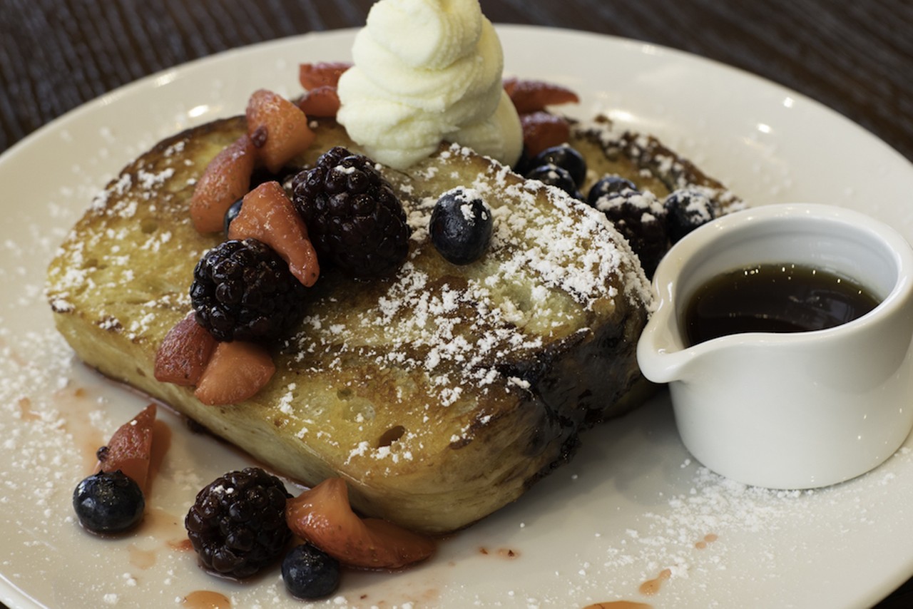 This is the French toast with cinnamon swirl sourdough, berries, sweet cream and maple syrup.