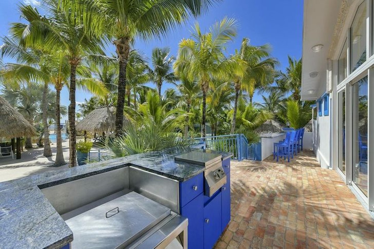 A Florida beach compound with its own lighthouse and private water park is now on the market