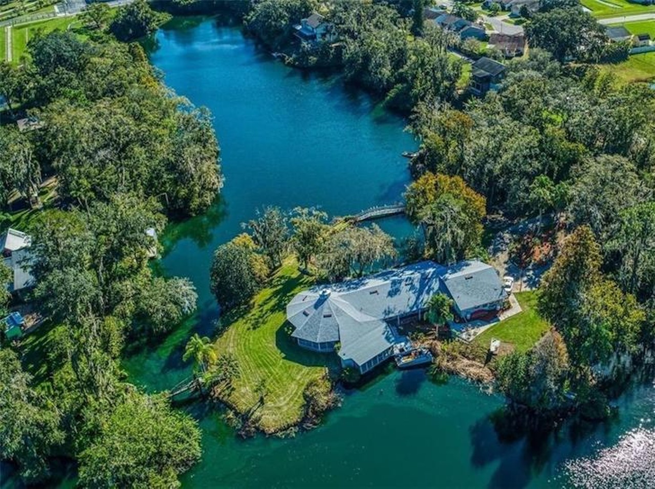 A Lakeland dodecagon-style house is now for sale, and it sits on its own private peninsula