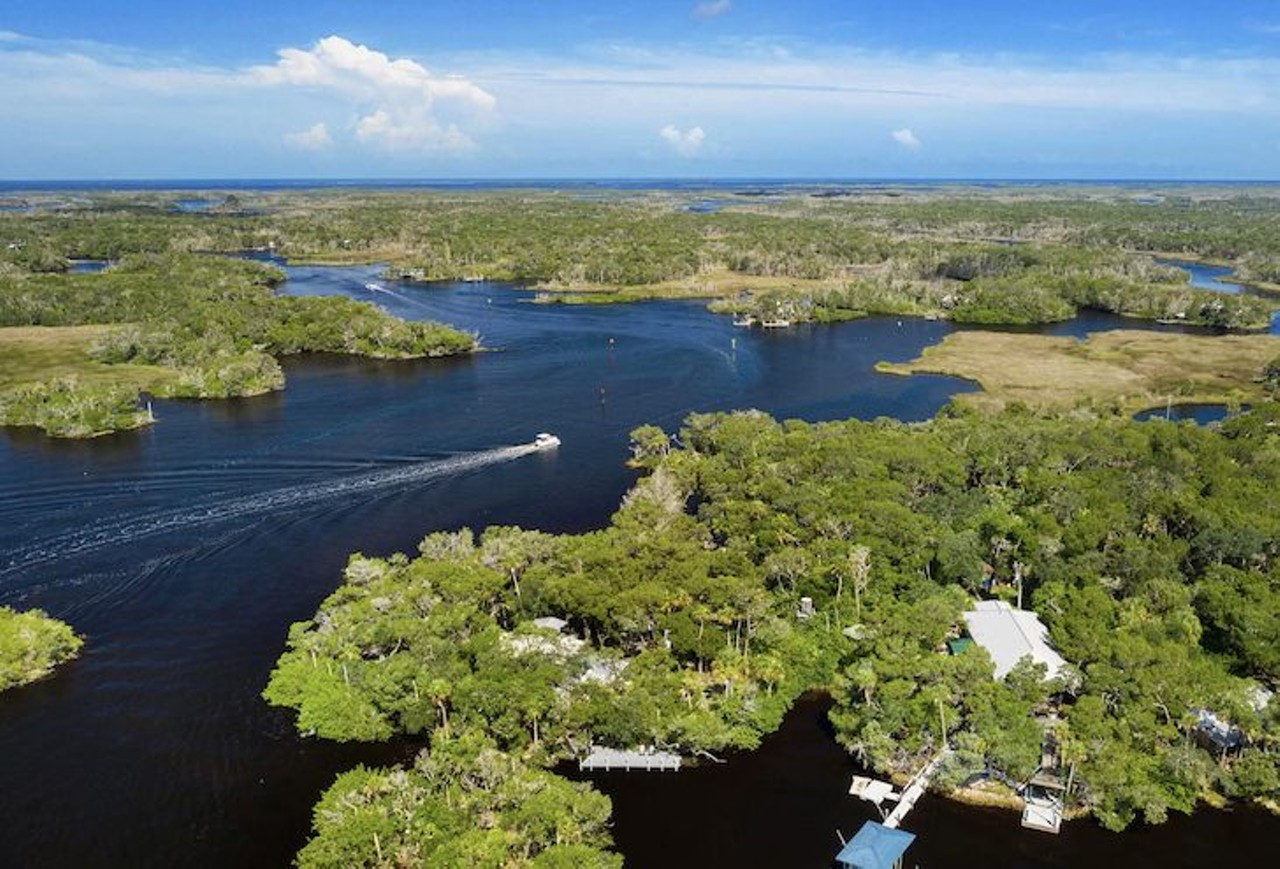 A river cabin on a private island near Tampa Bay is now for sale for $500K