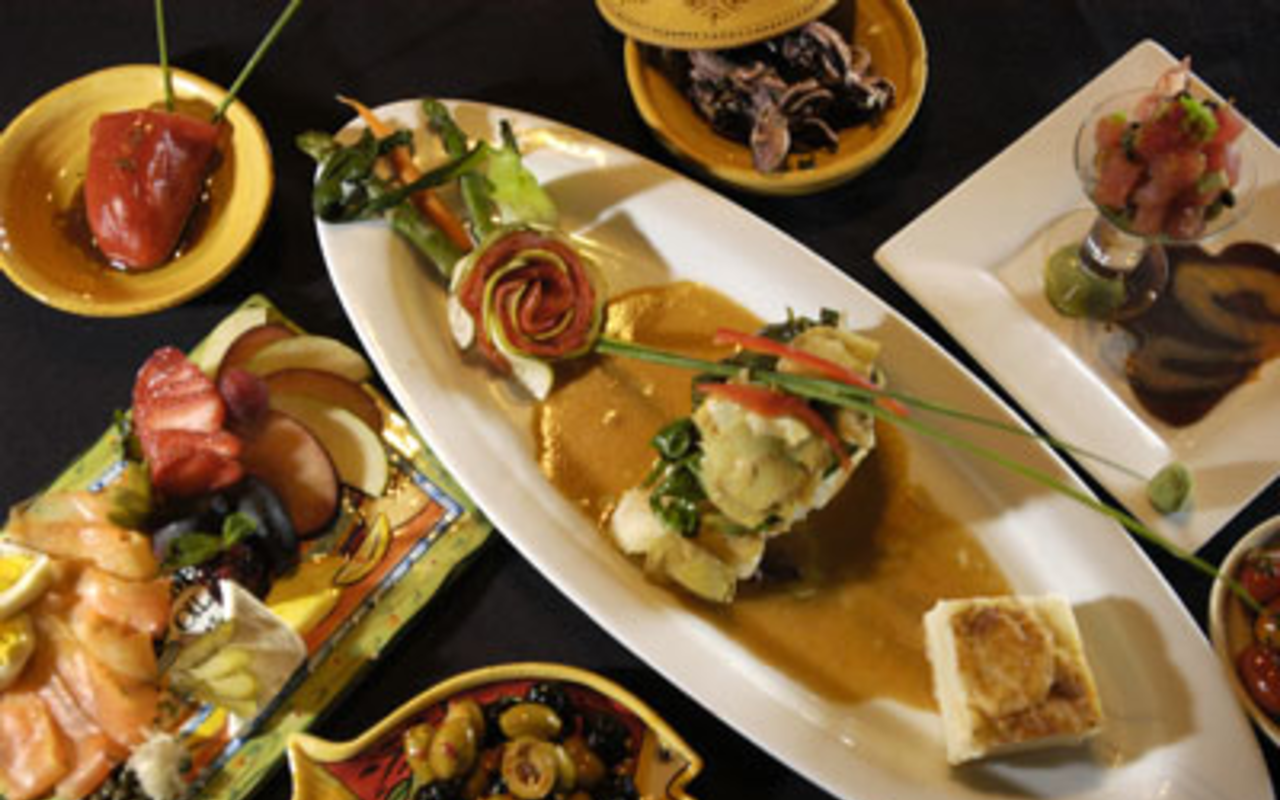 SURROUNDED: A nightly special of seabass (center), accompanied by a selection of The Pearl's tasty tapas.