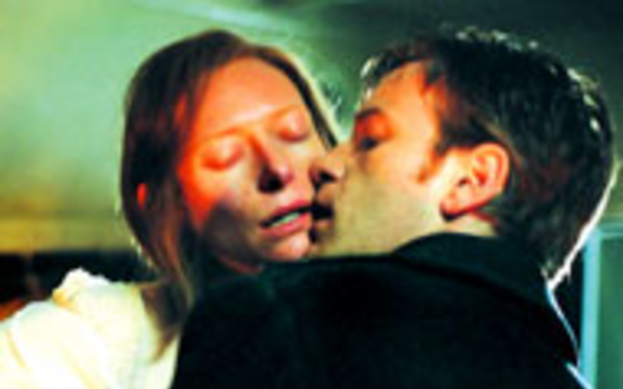 BARGING IN: Ella (Tilda Swinton), an unhappy 
    housewife (barge wife, actually) under the spell of 
    serial adulterer Joe (Ewan McGregor), in Young 
    Adam