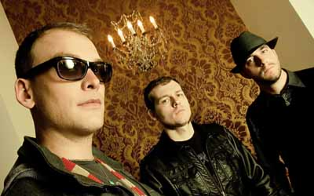 DEALING WITH THE DEVIL: Though happy in his personal life, Alkaline Trio's Matt Skiba (left) still draws upon demons for his songwriting.