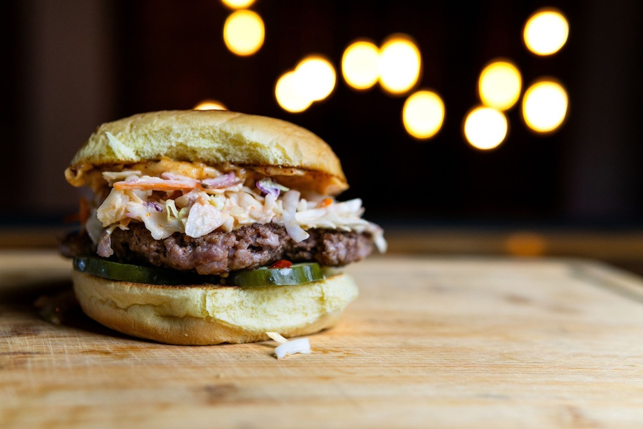 
Coppertail Brewing Co.
2601 E 2nd Ave., Tampa
Asian Pork Burger: Garlic, sesame, ginger pork patty, creamy Asian slaw, gochujang mayo and  kimchi-style cucumber pickles. ($10)
Photo courtesy of Coppertail Brewing Co.