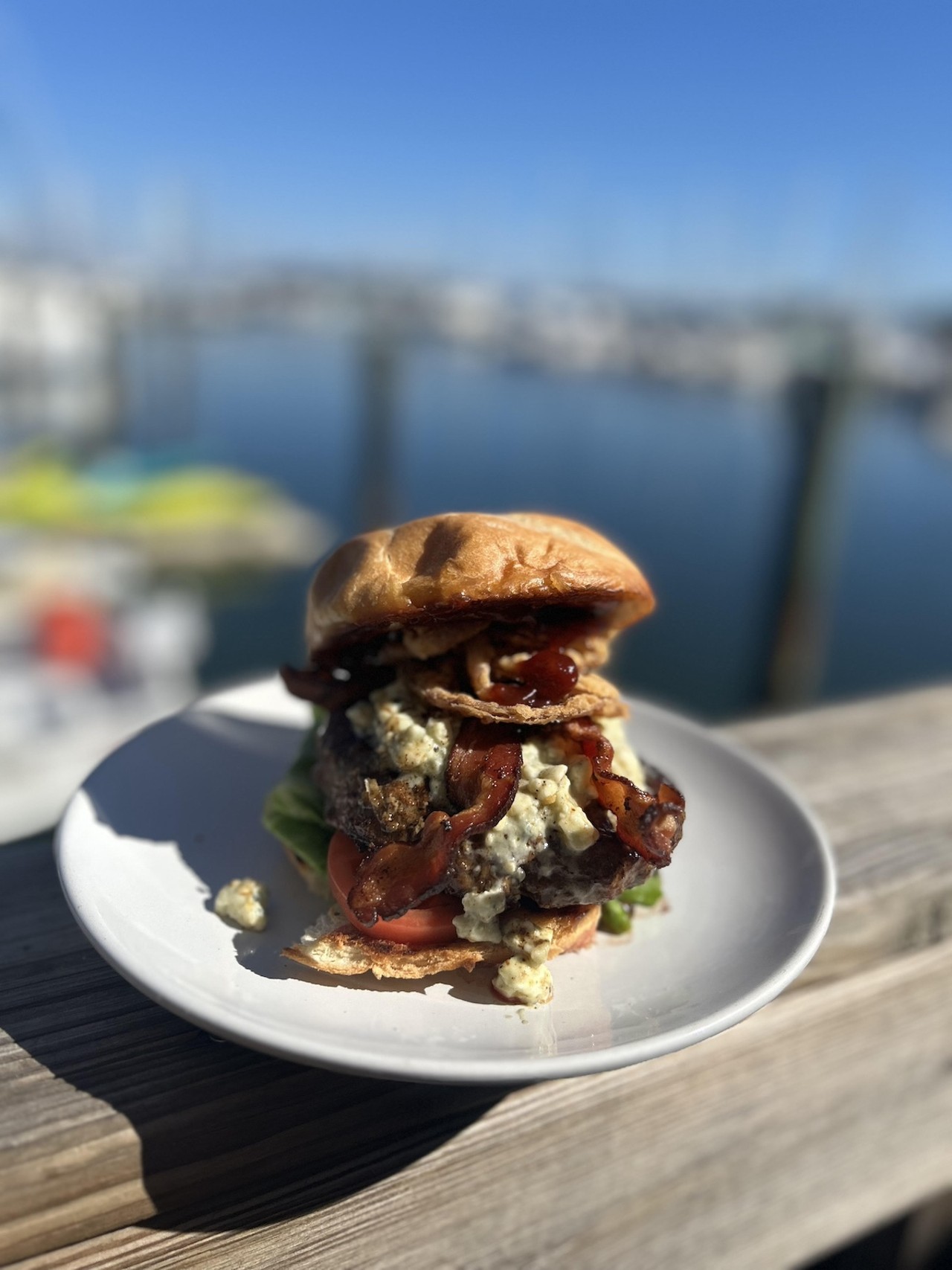 
Fresco's Waterfront Bistro
300 2nd Ave. NE, St. Petersburg
Black and Blu Burger: Lightly-blackened 8 oz. angus burger, with melted blue cheese crumbles, fried onions strings, bacon, BBQ sauce, lettuce, and tomato. ($10)
Photo courtesy of Fresco's Waterfront Bistro