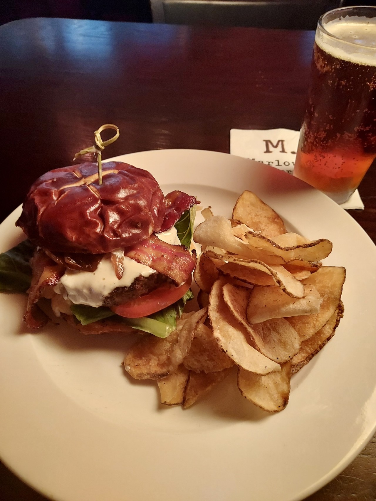 
Marlow's Tavern
13134 N Dale Mabry Hwy., Tampa
Bacon & Brie Burger:  Grill Tavern Burger topped with melted brie, hickory-smoked bacon, caramelized onions, lettuce and tomato served on a pretzel bun. ($12)
Photo courtesy of Marlow's Tavern