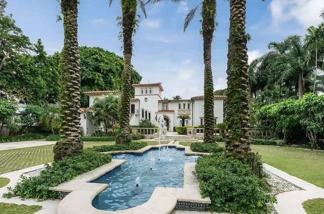 An actual dog is selling its Florida mansion, which once belonged to Madonna