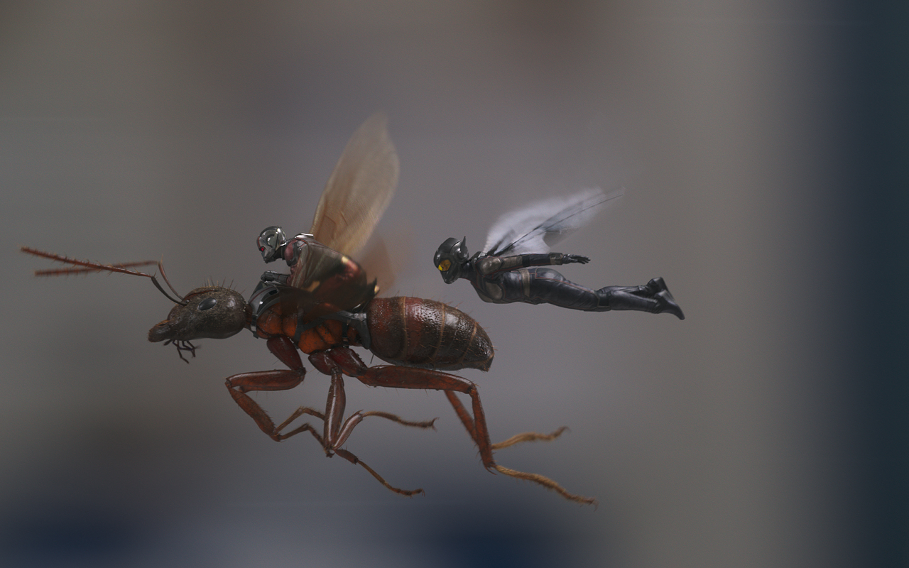 Ant-Man (Paul Rudd), left, and The Wasp (Evangeline Lilly) fly into action to try and save a loved one trapped inside the Quantum Realm.