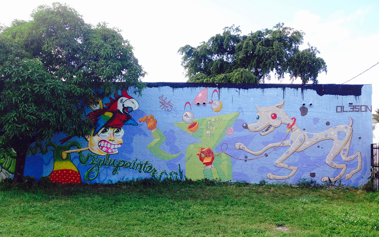 A finished mural on the wall of a Wynwood church.