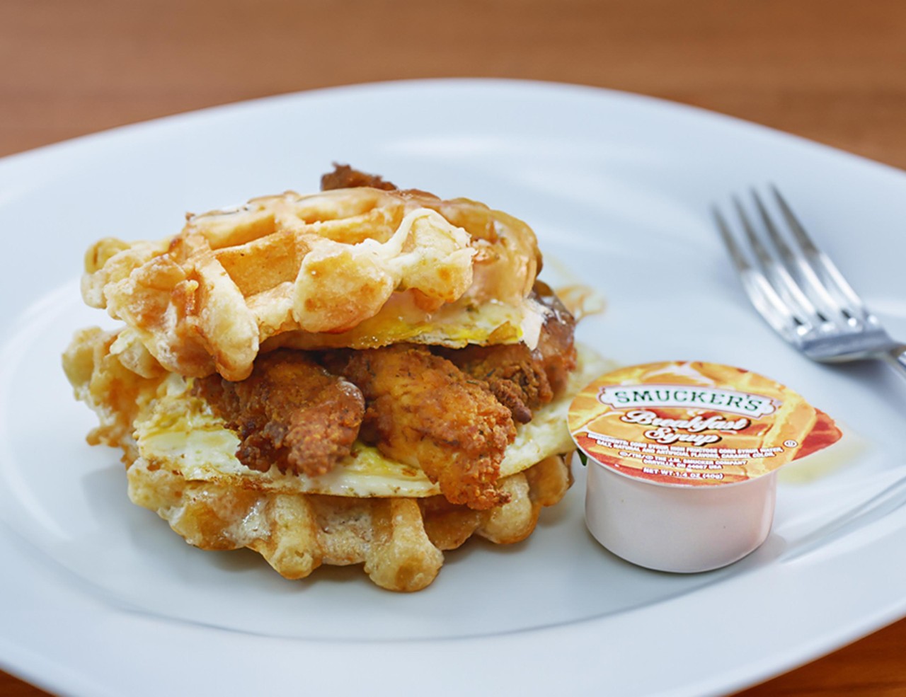WAFFLE CHICKEN SANDWICH
Two waffles - pepperjack cheese for that spicy kick, chicken tenders and two eggs! It’s the best brunch around town! Pair this with a Cuban coffee and you’re set! 
The Bean Bar Co