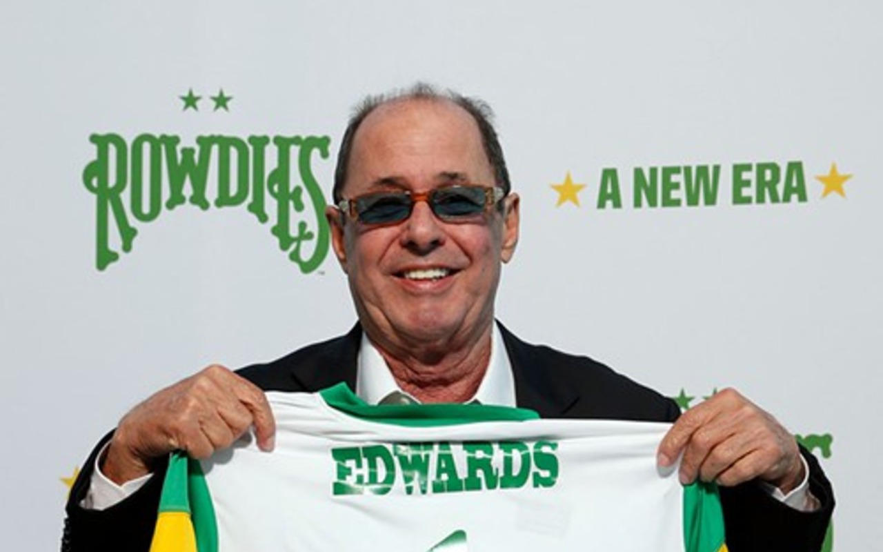 Shortly after announcing the changes to Al Lang Stadium, new owner Bill Edwards shows off a Rowdies jersey with his name on it.