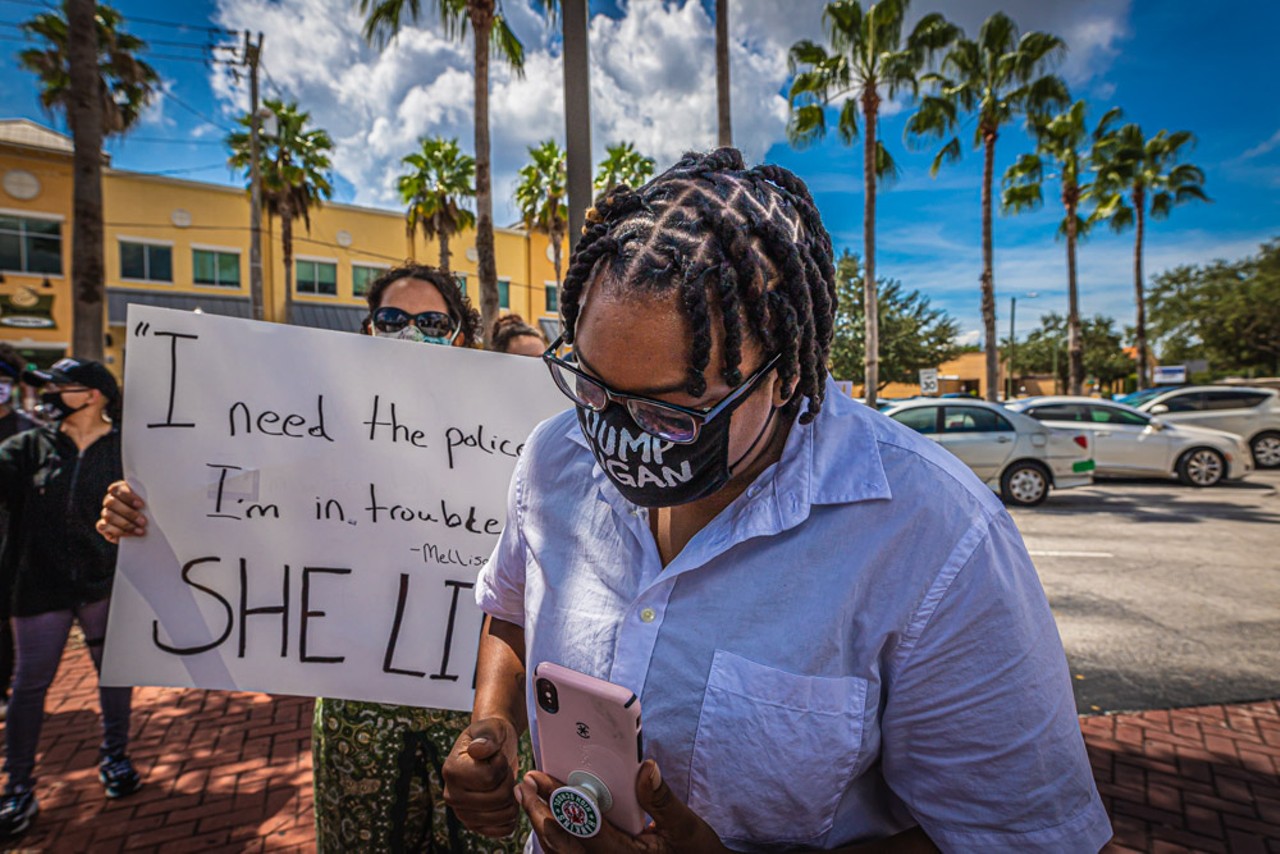 Black Lives Matter and back the blue protesters meet outside South Tampa CVS
