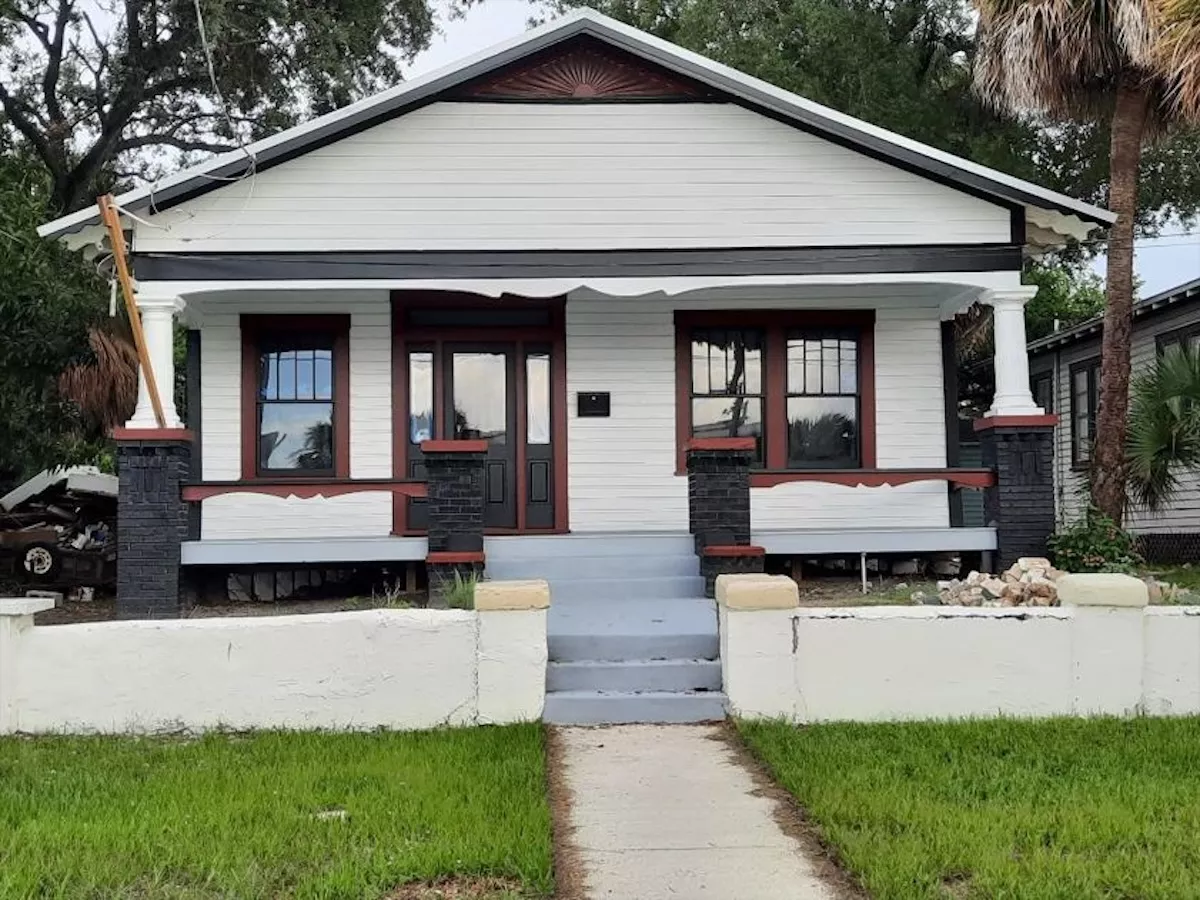 July 2024 Photo of Bookends Bungalow After Foundation Repairs, New Roof, and Facade Repairs