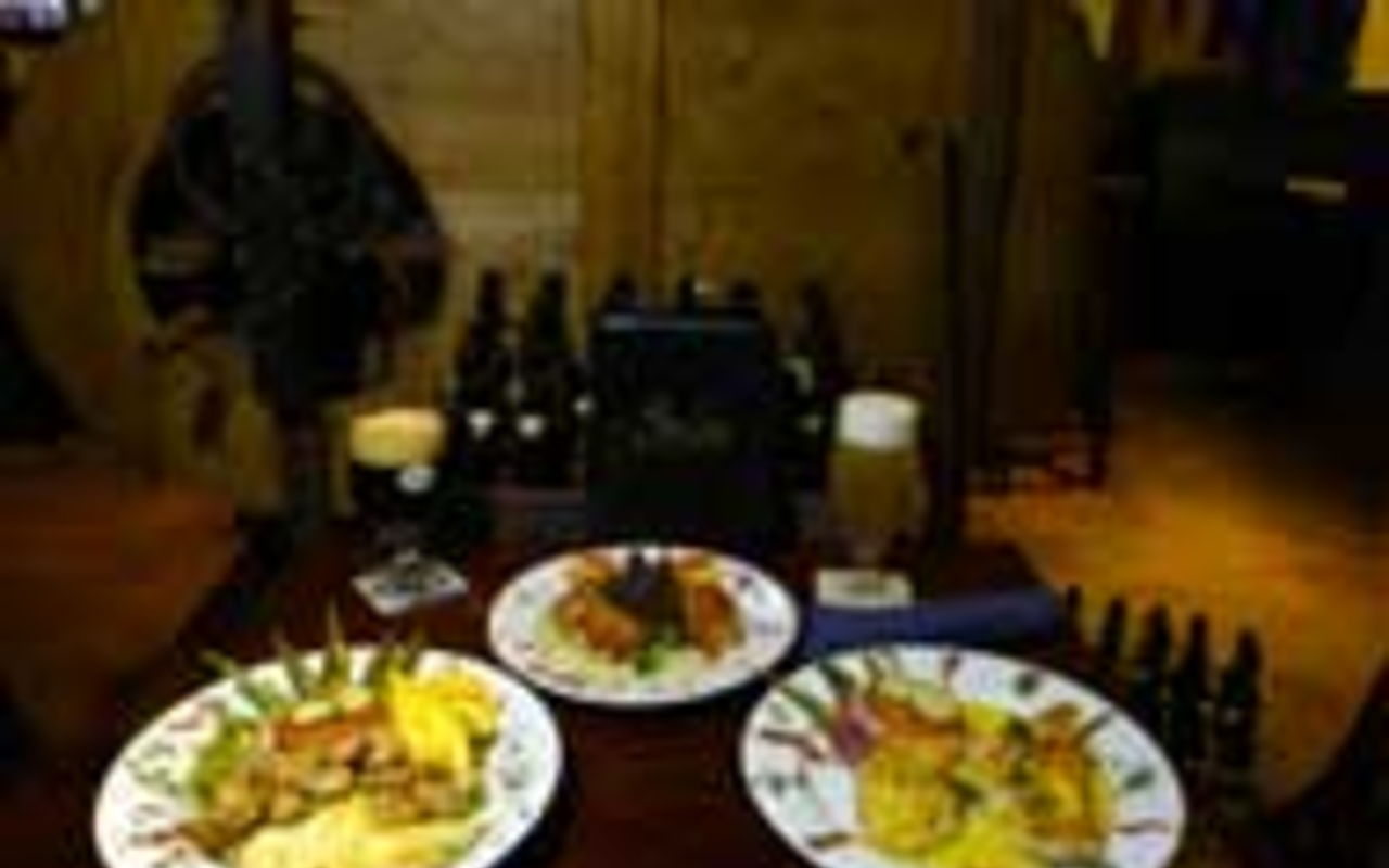 DON'T COME LOOKING FOR WAFFLES: Saint 
    Sebastiaan's Belgian cuisine includes, from left, 
    their signature salad, a scallops appetizer and 
    grouper mango.