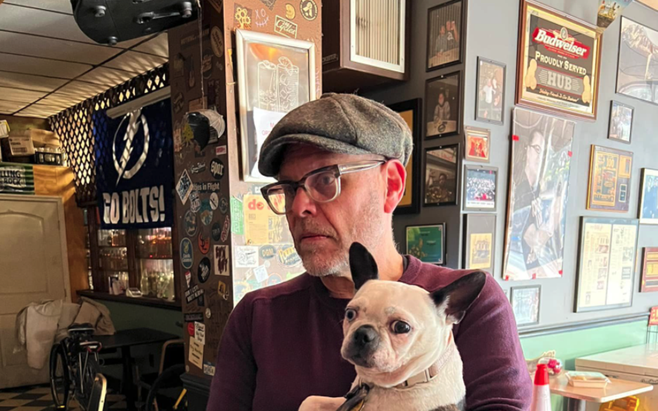 Alton Brown and his dog Scabigail van Buren Brown at The Hub in Tampa, Florida on Feb. 7, 2022.