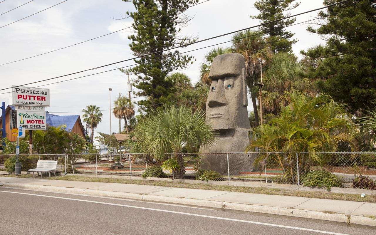 GOLF GOD: An Easter Island statue greets visitors to the Polynesian Putter, established in 1966.