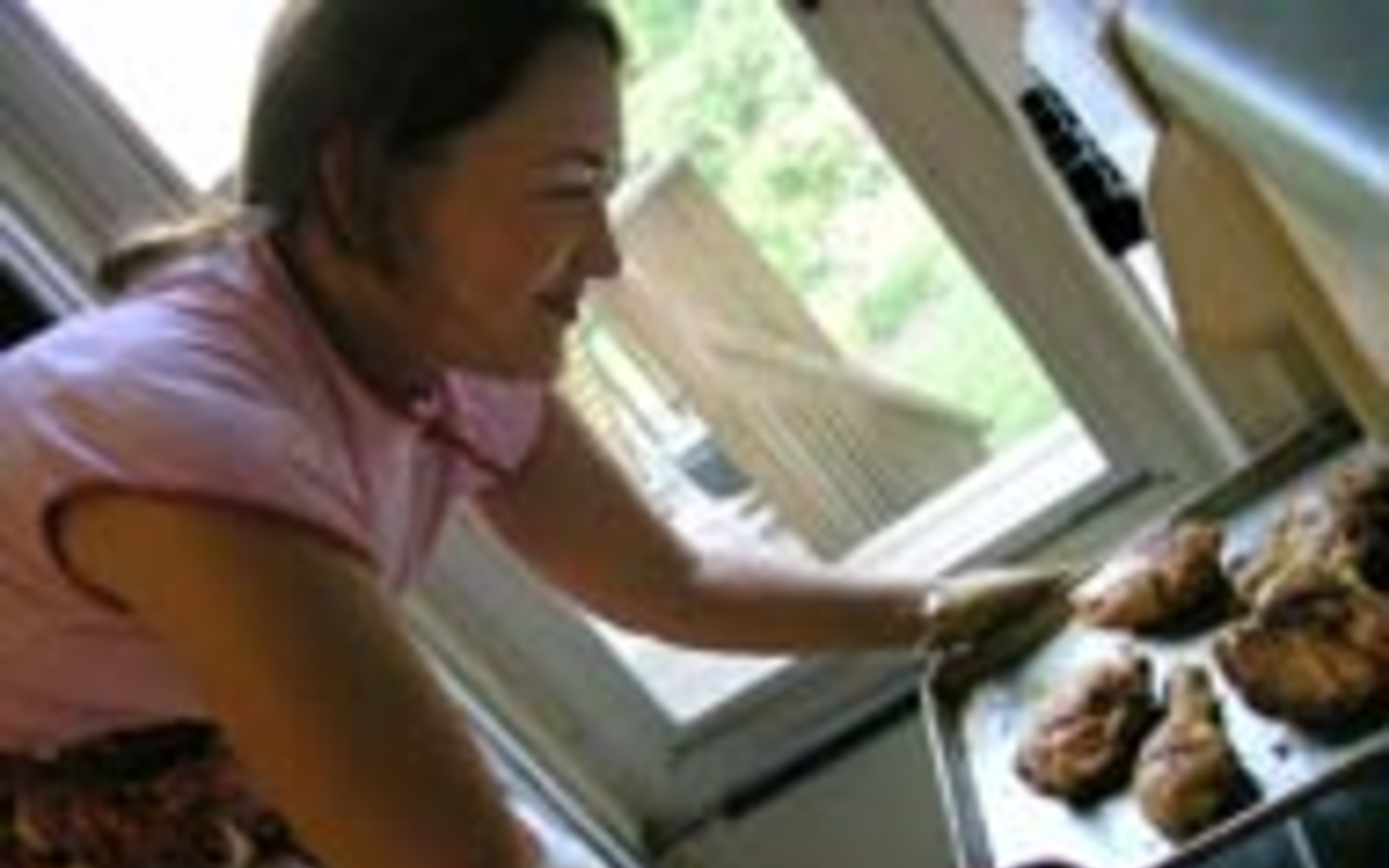 BAKE, HOLD THE SHAKE: Kim O'Donnel finishes her fried chicken in the oven.