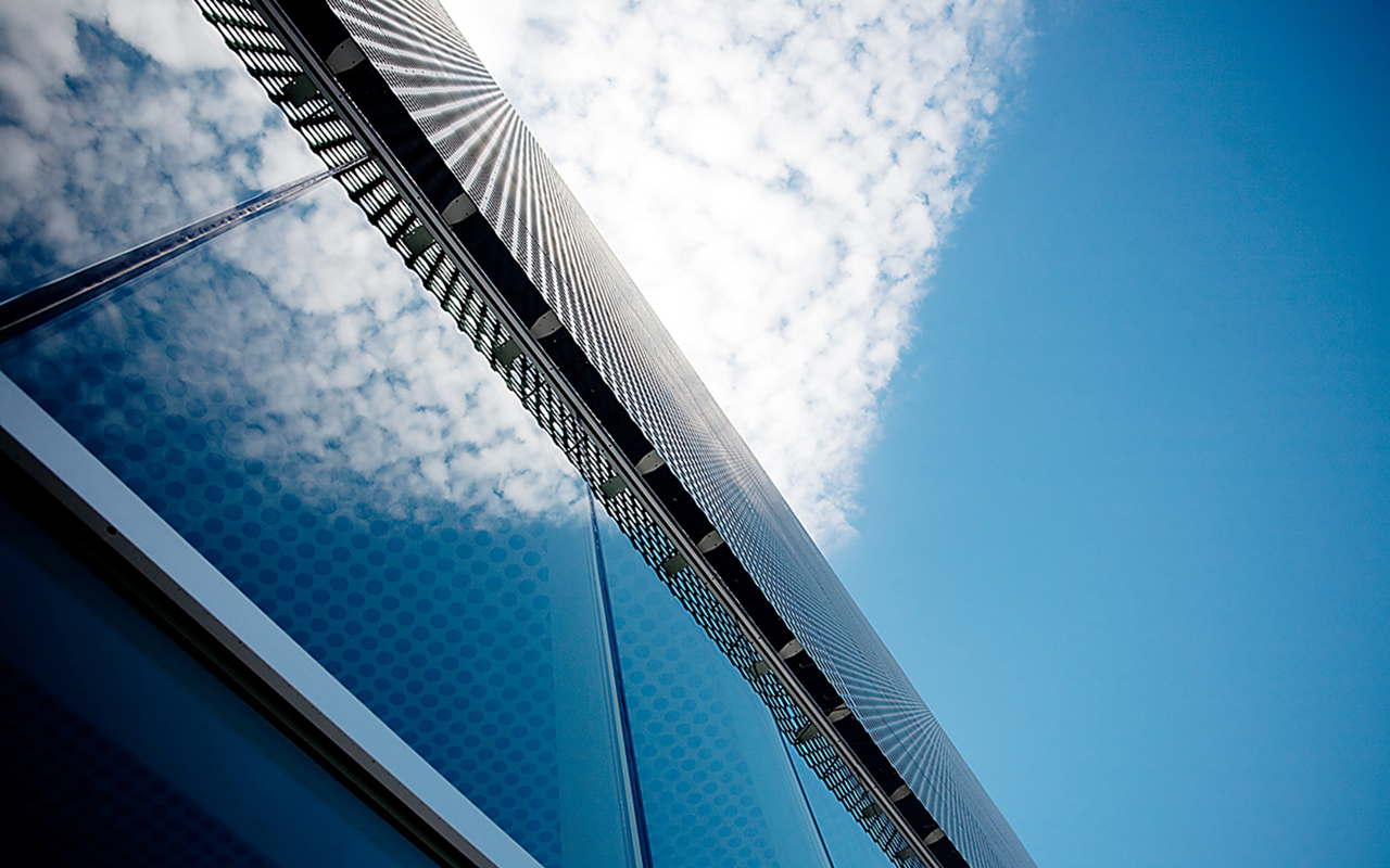 ERECTOR SET: Metal, glass and sky at play on the exterior of the Tampa Museum of Art.
