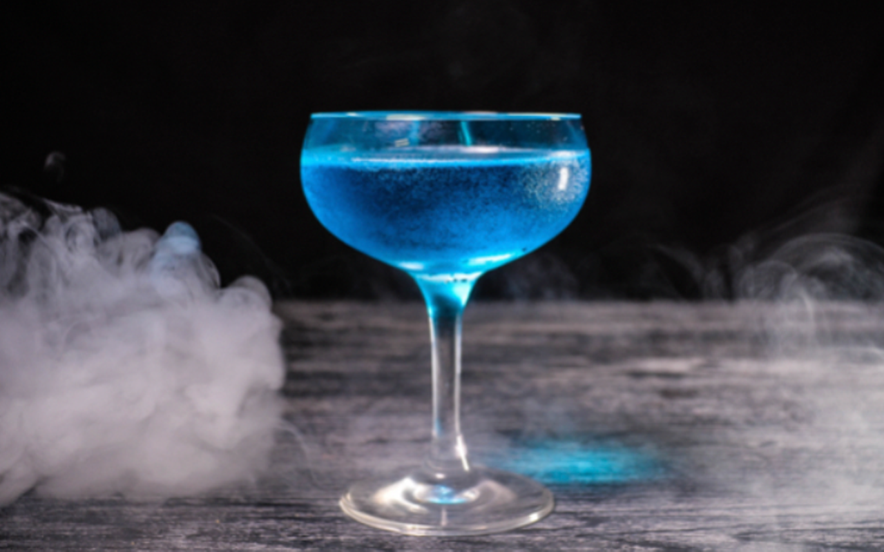 GoT themed cocktail, the Ice Dragon, crafted with Dixie Mint Vodka, 360 Vanilla Vodka, Giffard Blue Curacao and Compass Box Peat Monster Scotch.
