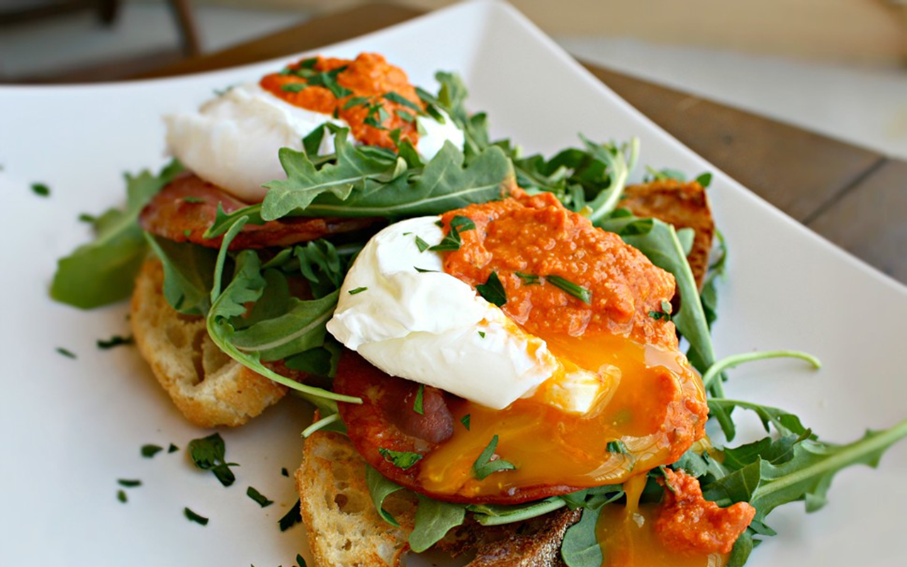 Dine in this Mother's Day and treat mom to this elegant meal: Poached Eggs on Ciabatta with Pancetta, Arugula and Romesco Sauce