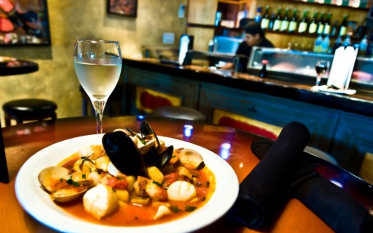 Cheap's Zarzuela is a shell fish "opera" cooked in a tomato sherry wine broth.