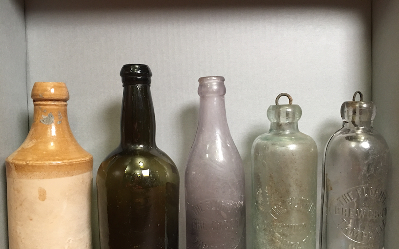 A history of Tampa Bay beer in five bottles, l-r: From earliest to more recent bottles of beer (first two are likely from breweries outside Florida).