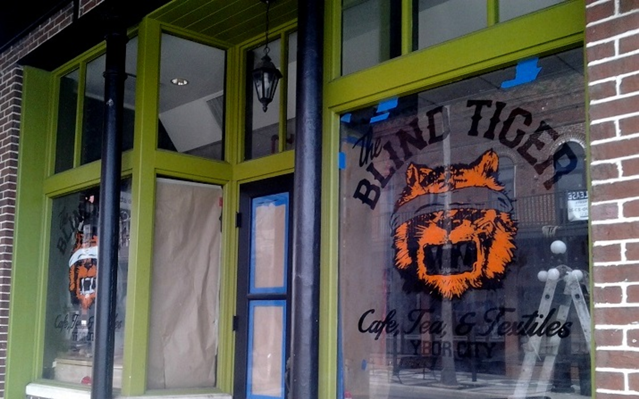 The Blind Tiger Cafe rests in a restored brick building on East Seventh Avenue.
