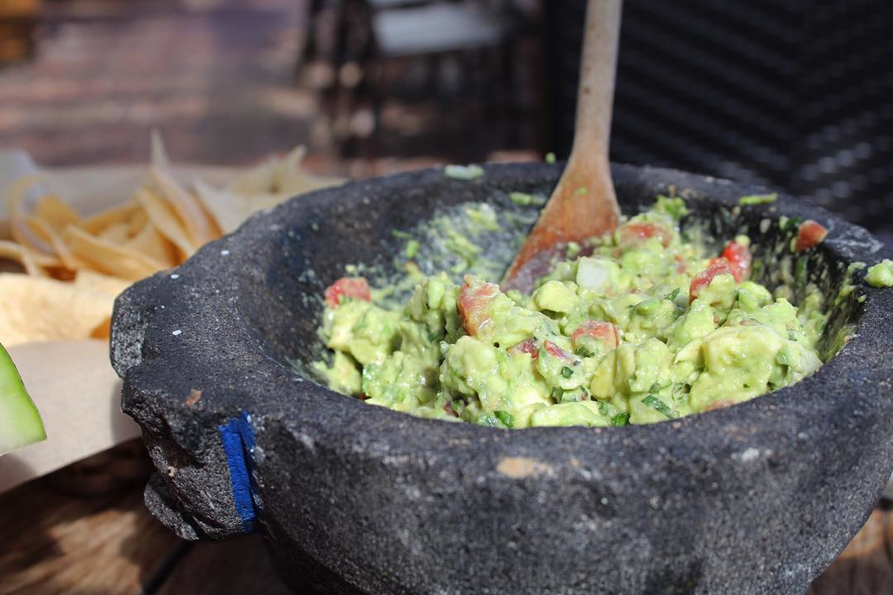 Besito's infamous tableside guacamole. Trust us, it's. that. good.