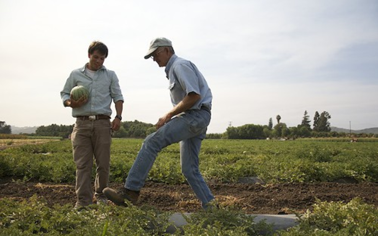 In Organic We Trust's Kip Pastor (left) with one of the farmer's featured in his latest film.