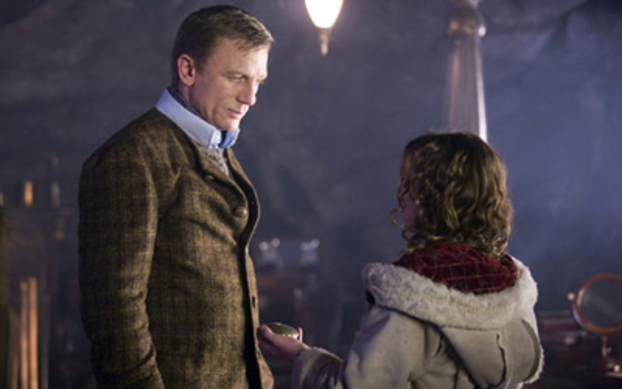 THE ANSWER'S WITHIN: Daniel Craig and Dakota Blue Richards come to possess a magical compass in The Golden Compass.