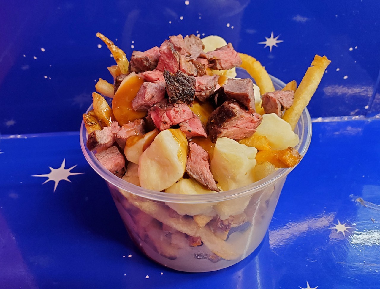 Poutine Sundae
"Fresh Cut fries topped with fresh cheese curds covered in gravy. Add sirloin steak to make the ultimate Cheese Steak!"     
Where to find it: DeAnna's Steak Sundaes