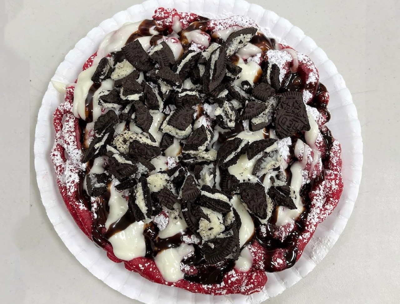 Cookies & Cream Funnel Cake           
"Red Velvet Cookies and Cream funnel cake with a fudge drizzle."                        
Where to find it: Paulette's Food