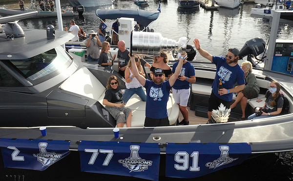 Steven Stamkos hoists the Stanley Cup during the Tampa Bay Lightning's boat parade on Sept, 30, 2020.