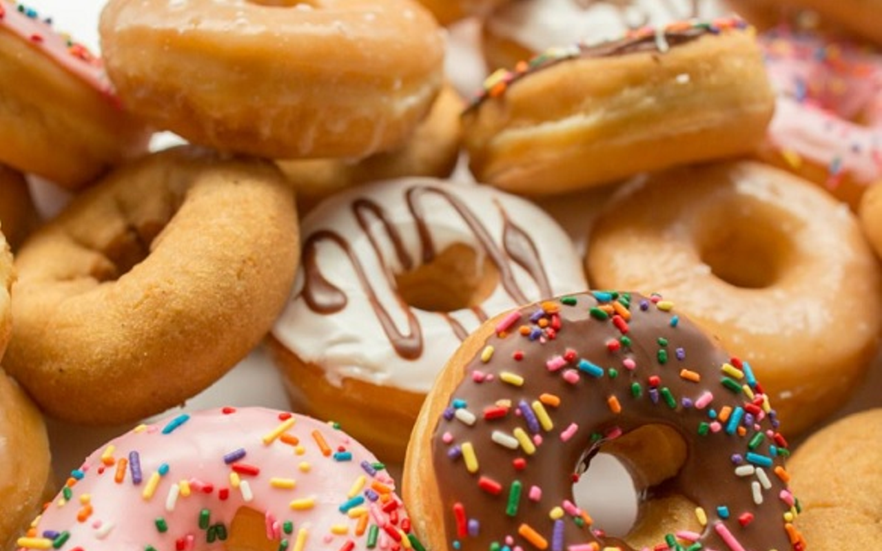 Score a free doughnut with the purchase of any beverage at Dunkin' for National Doughnut Day.
