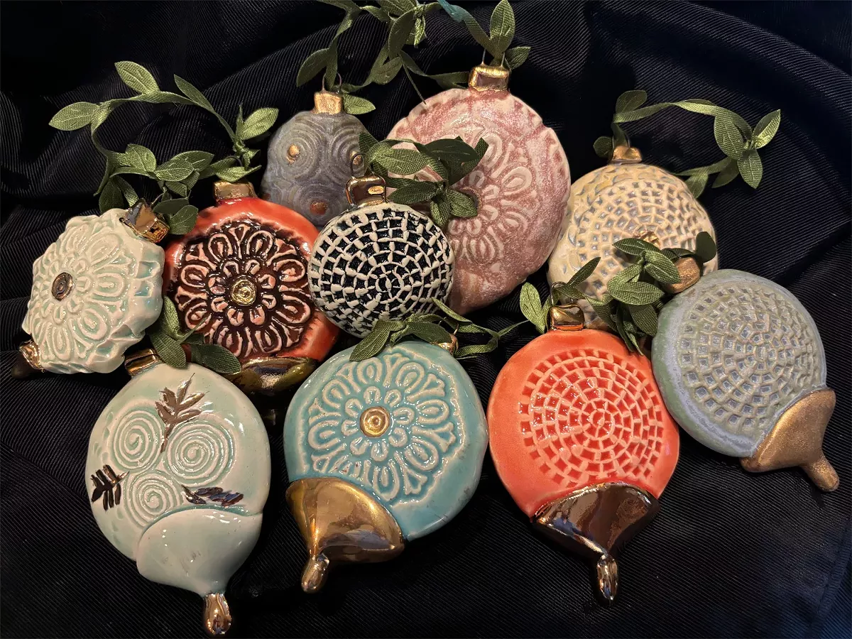 These handmade ceramic ornaments will be available at The Gift of Art show and sale