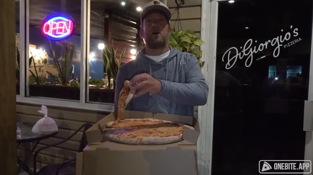 DiGiorgio’s Pizzeria (7.5)191 Orange St., Palm HarborTechnically in Ozona, Portnoy watch owner  Anthony DiGiorgio fan out as he said locals could happily eat this “super basic football-looking pizza” three times a week.Photo via One Bite Pizza Reviews/YouTube (screengrab by Creative Loafing Tampa Bay)