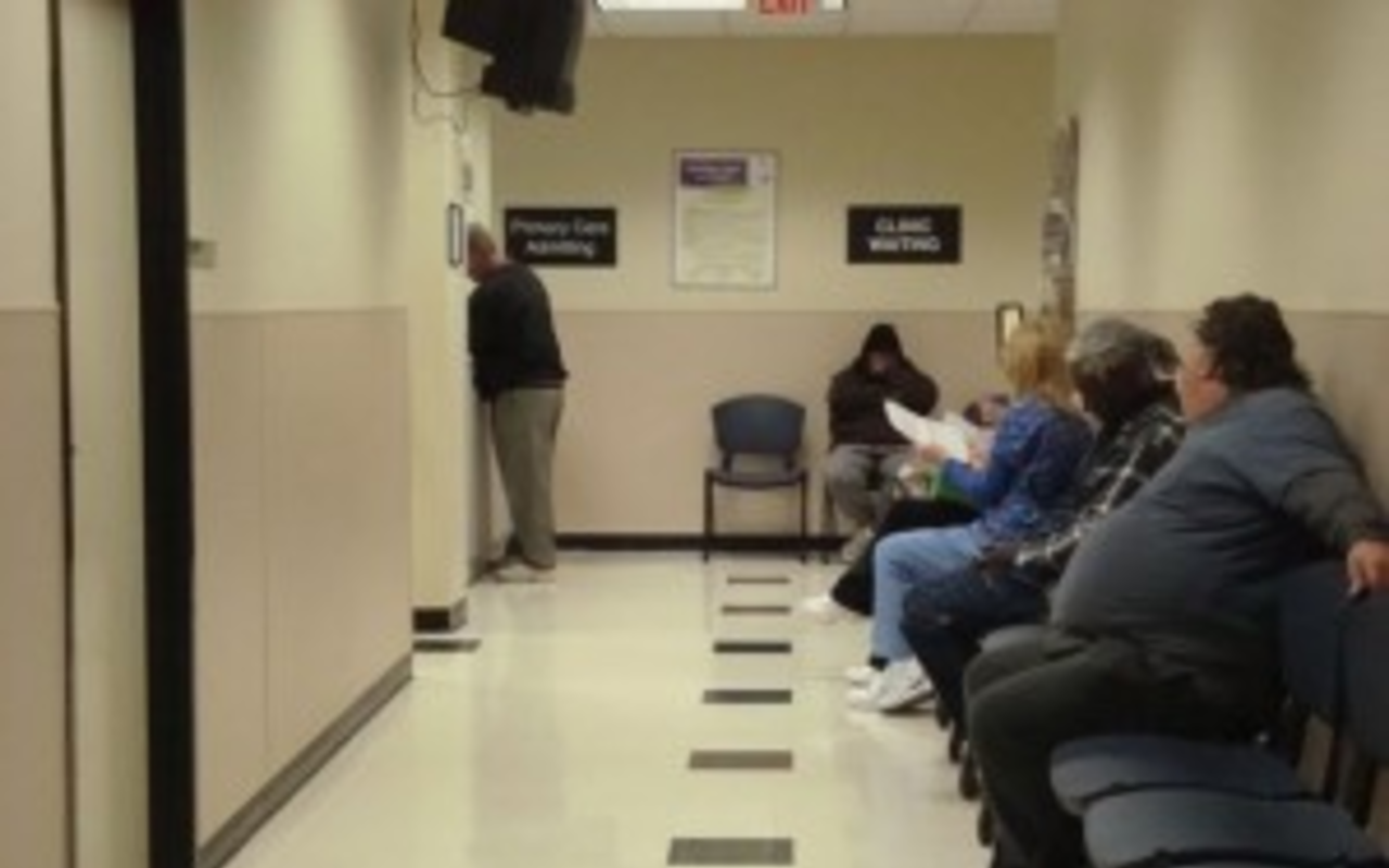 Patients waiting in line at the St. Petersburg Health Department's Primary Care center