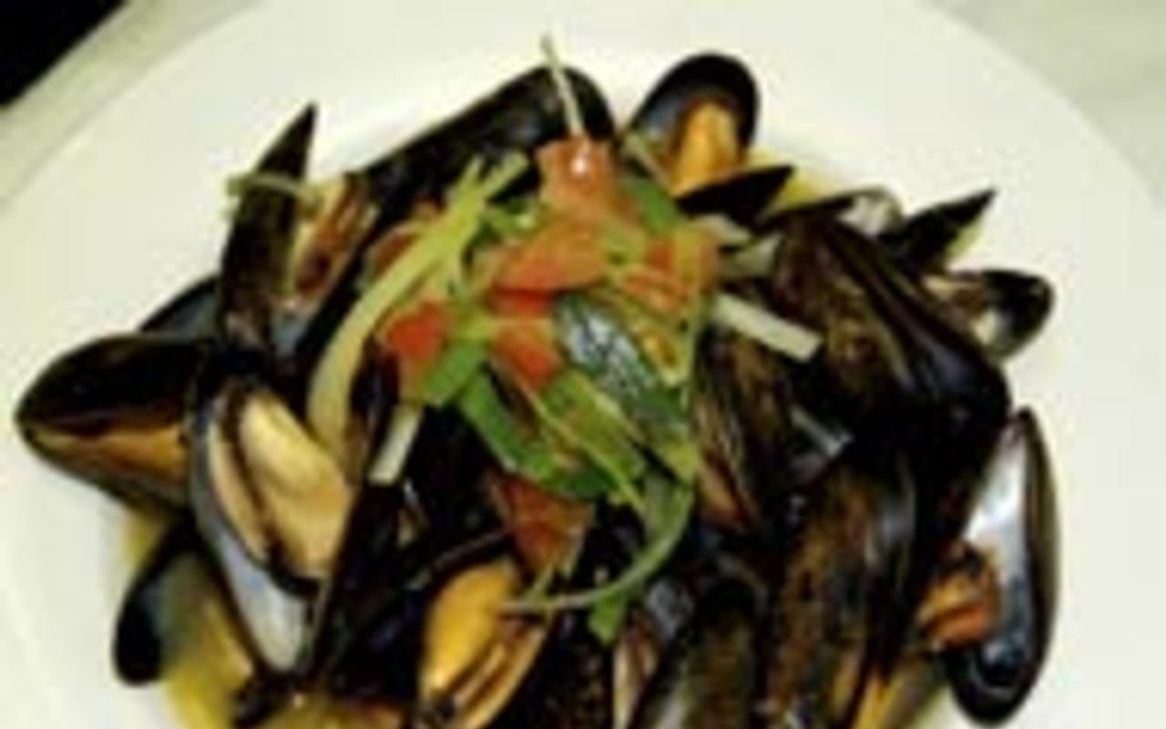 FLEX FOR ME: Prince Edward island mussels 
    steamed in saffron-garlic broth.