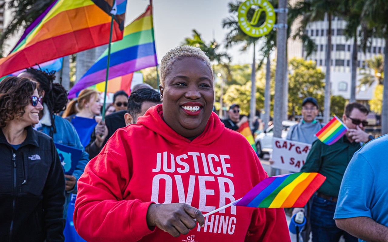Michelle Rayner marches in St. Petersburg, Florida on March 12, 2022.