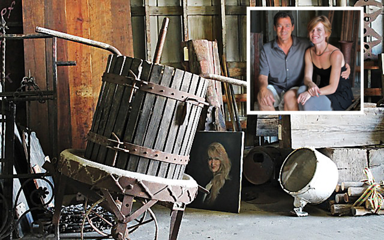 INTERIOR LIVES: Larry & Charlie Schiller with finds from their architectural salvage company.